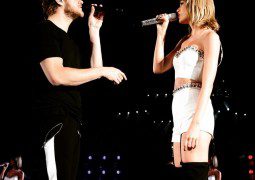 Taylor Swift with Dan Reynolds of Imagine Dragons performing Radioactive